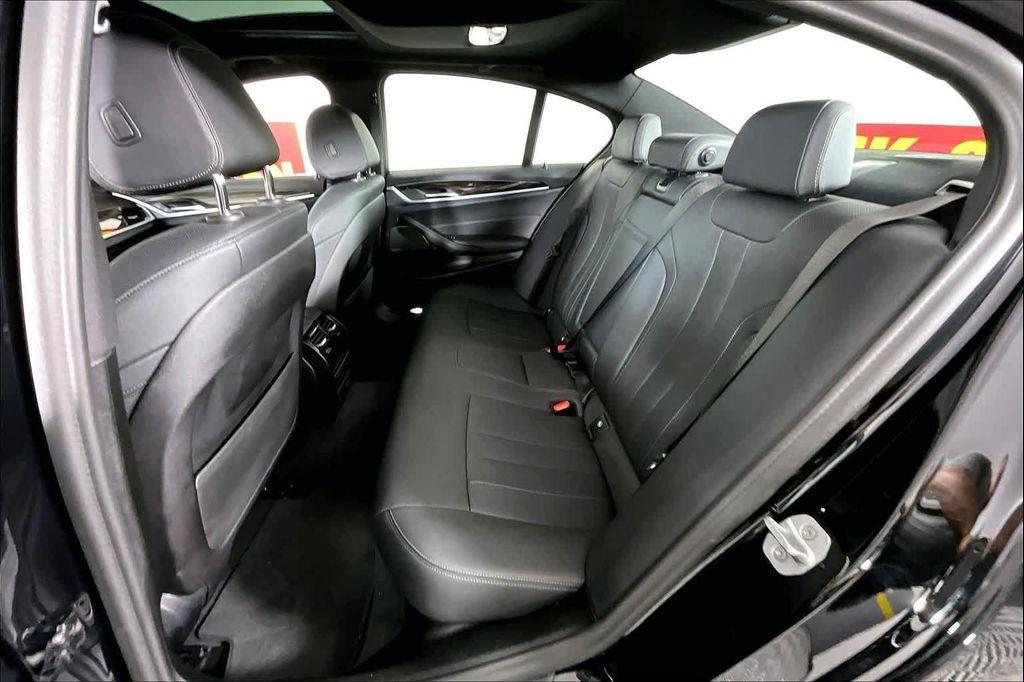 used 2023 BMW 530e car, priced at $29,284