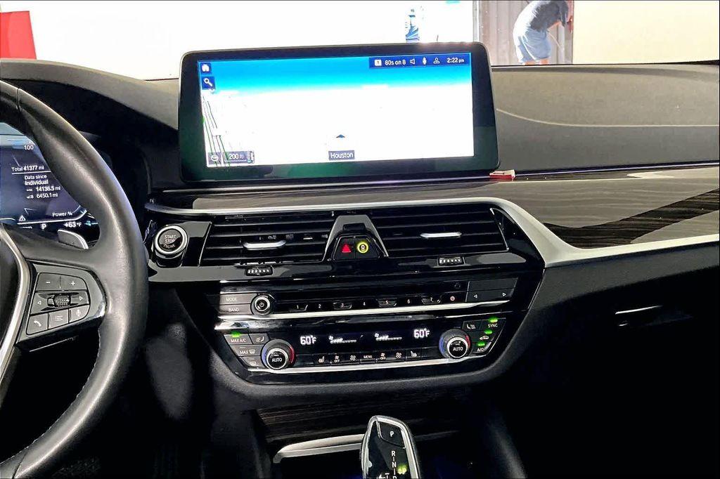 used 2023 BMW 530e car, priced at $29,284