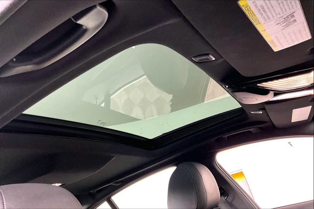 used 2023 BMW 530e car, priced at $29,284