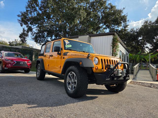 used 2013 Jeep Wrangler Unlimited car, priced at $14,996