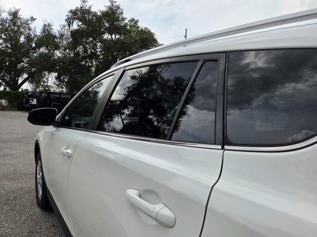 used 2013 Toyota RAV4 car, priced at $13,499