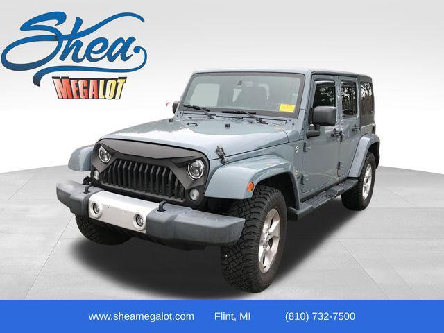 used 2014 Jeep Wrangler Unlimited car, priced at $8,275