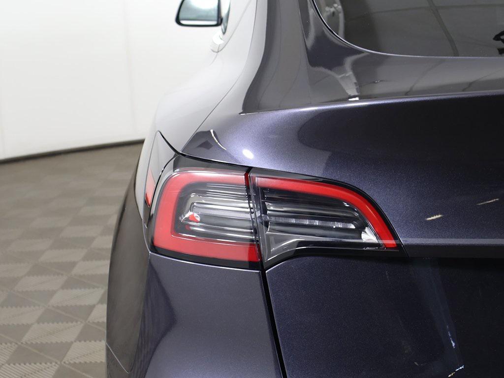 used 2024 Tesla Model Y car, priced at $30,399
