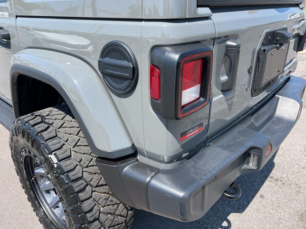 used 2021 Jeep Wrangler Unlimited car, priced at $24,930