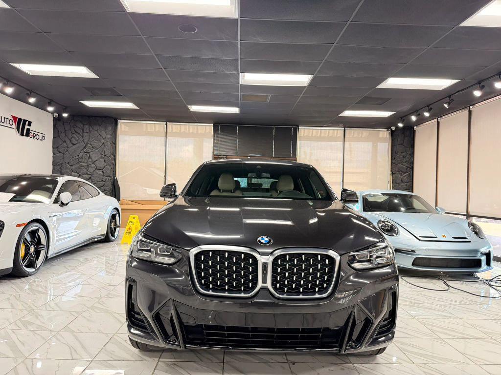used 2022 BMW X4 car, priced at $34,498