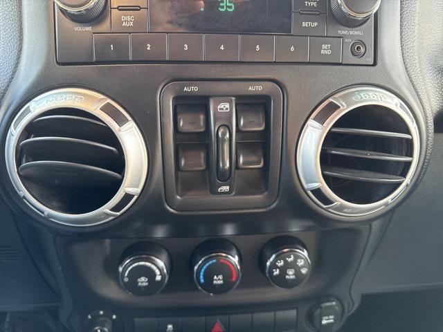 used 2015 Jeep Wrangler Unlimited car, priced at $14,300