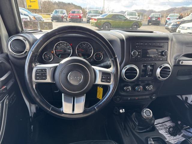used 2015 Jeep Wrangler Unlimited car, priced at $14,300