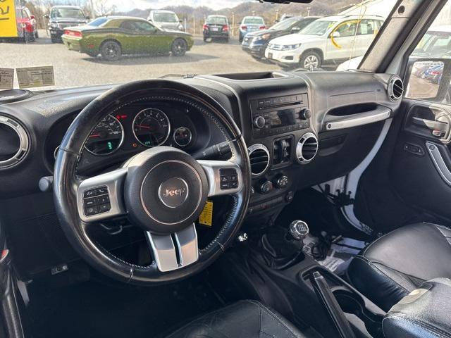 used 2015 Jeep Wrangler Unlimited car, priced at $14,300