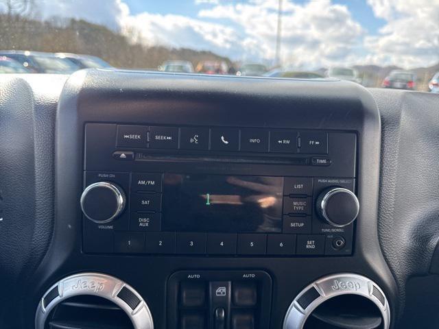 used 2015 Jeep Wrangler Unlimited car, priced at $14,300