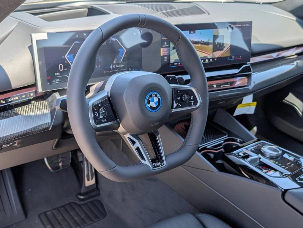 new 2026 BMW 550e car, priced at $84,450