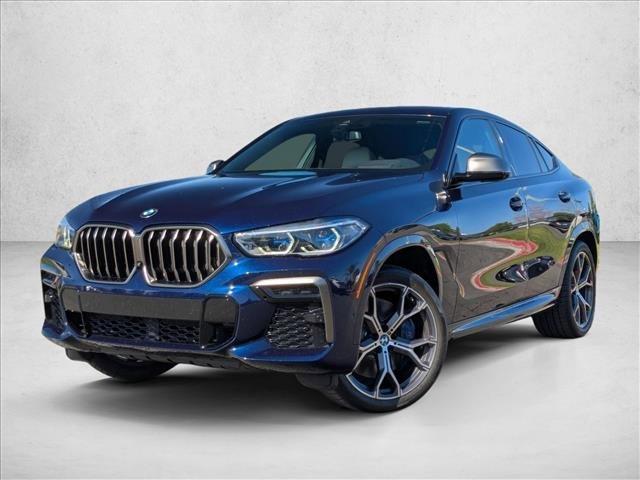 used 2023 BMW X6 car, priced at $57,497