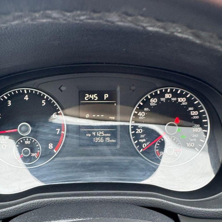 used 2015 Volkswagen Passat car, priced at $6,980