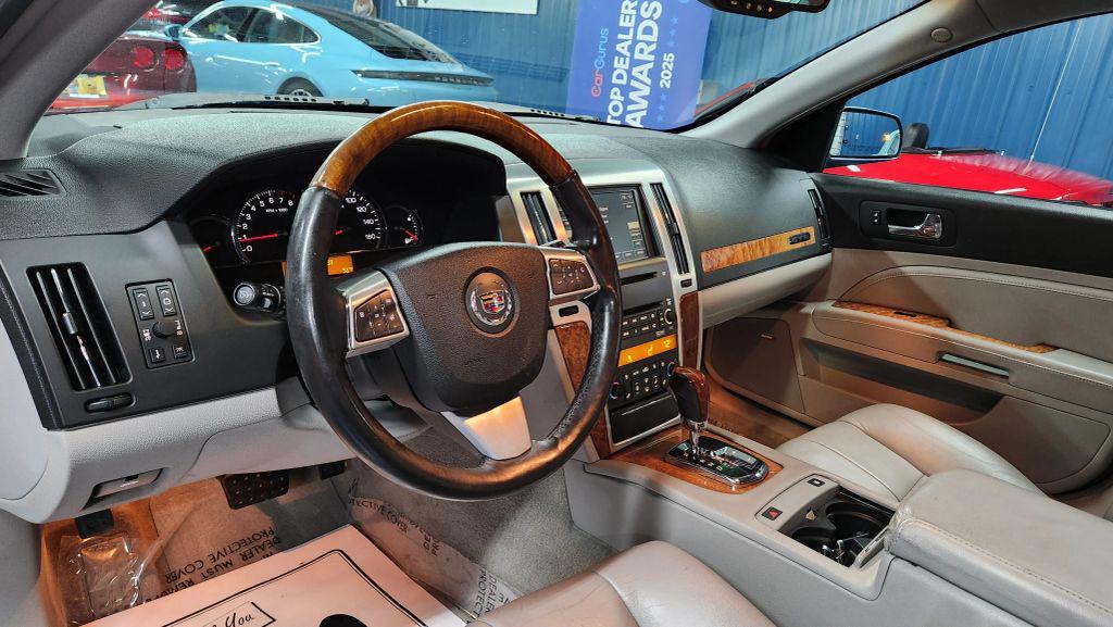 used 2010 Cadillac STS car, priced at $11,984