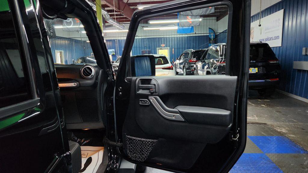 used 2015 Jeep Wrangler Unlimited car, priced at $14,887