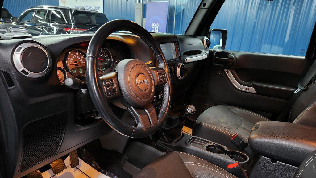 used 2015 Jeep Wrangler Unlimited car, priced at $14,887