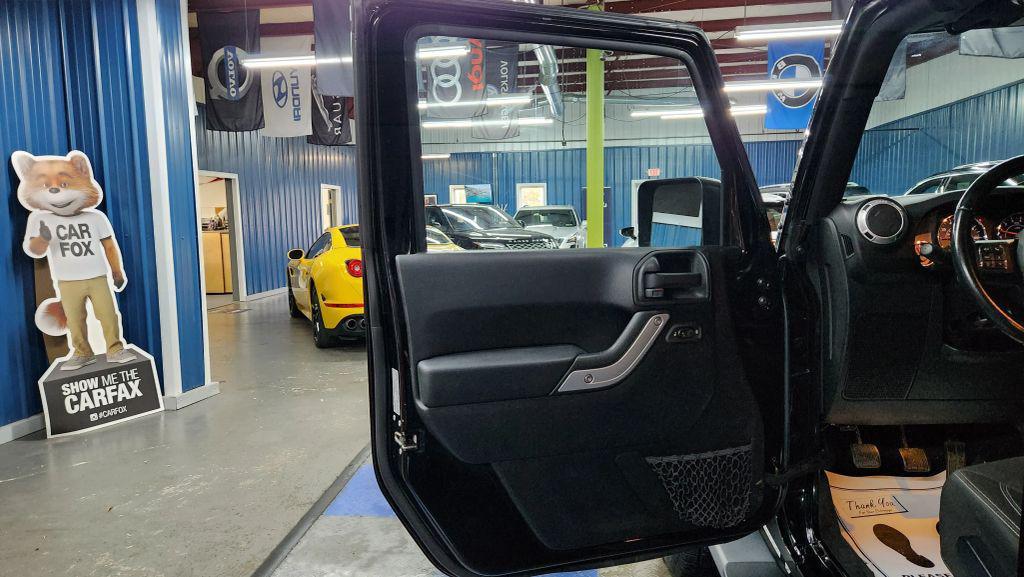 used 2015 Jeep Wrangler Unlimited car, priced at $14,887