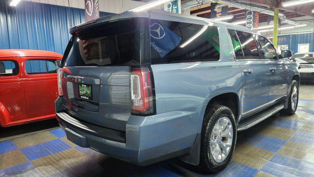 used 2015 GMC Yukon car, priced at $13,820