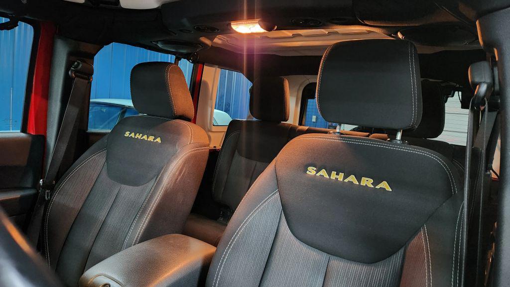 used 2014 Jeep Wrangler Unlimited car, priced at $15,465