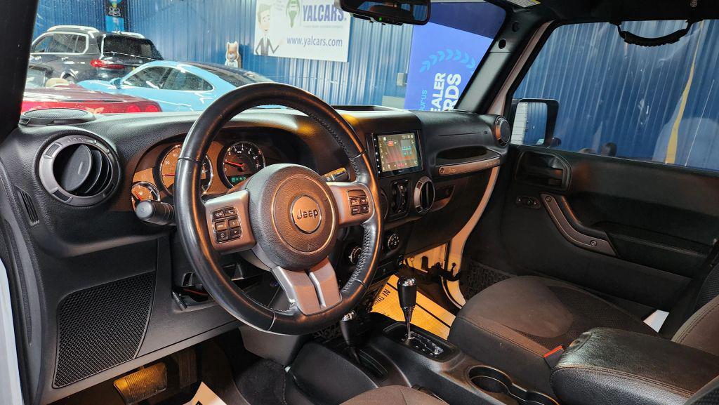 used 2017 Jeep Wrangler Unlimited car, priced at $17,319