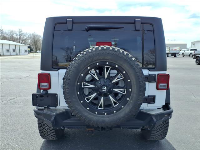 used 2018 Jeep Wrangler JK Unlimited car, priced at $23,995