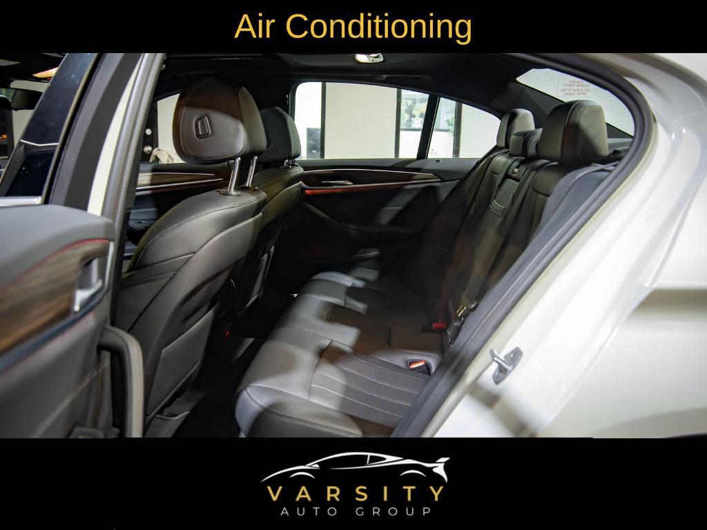 used 2022 BMW 530 car, priced at $26,599