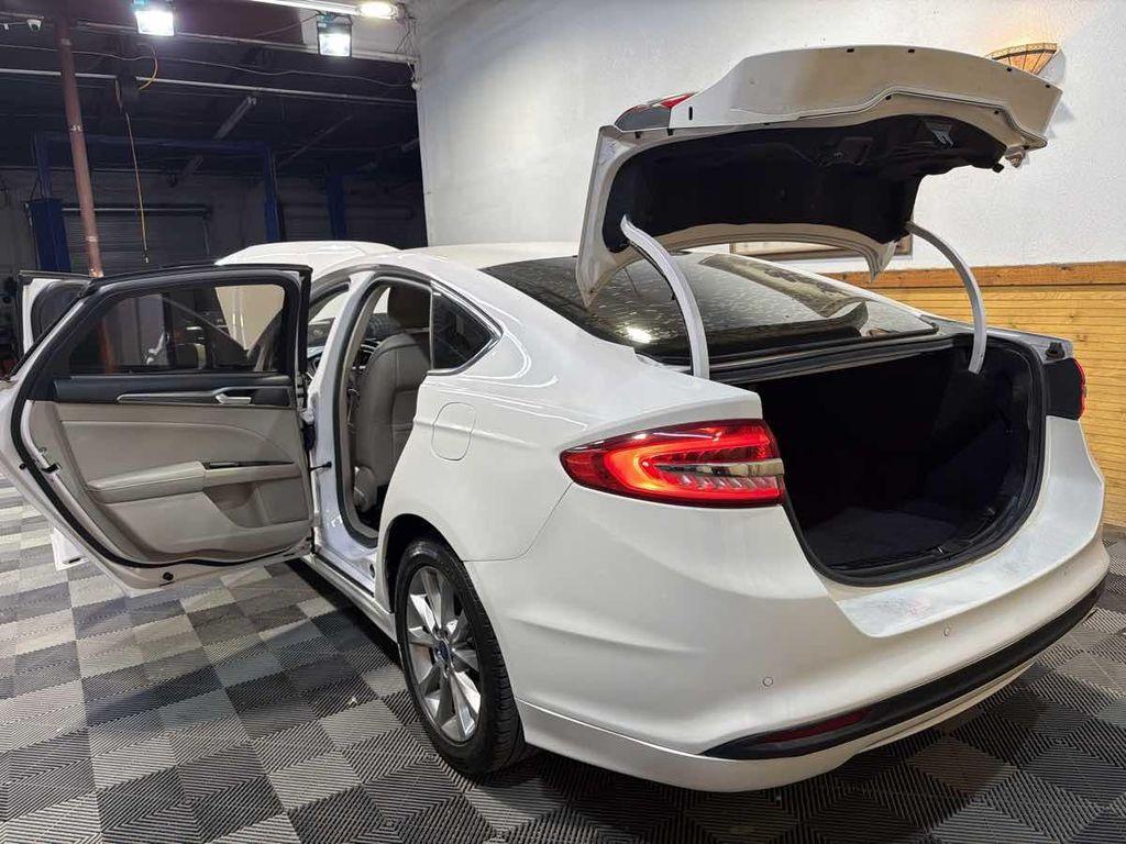 used 2017 Ford Fusion car, priced at $7,500