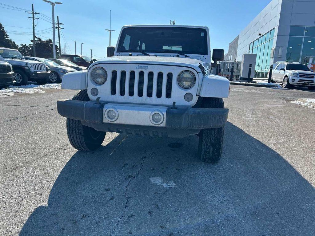 used 2014 Jeep Wrangler Unlimited car, priced at $16,999