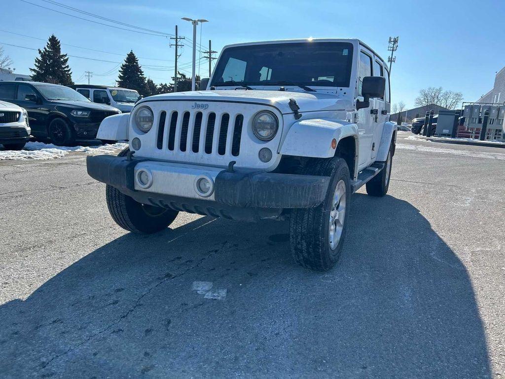 used 2014 Jeep Wrangler Unlimited car, priced at $16,999