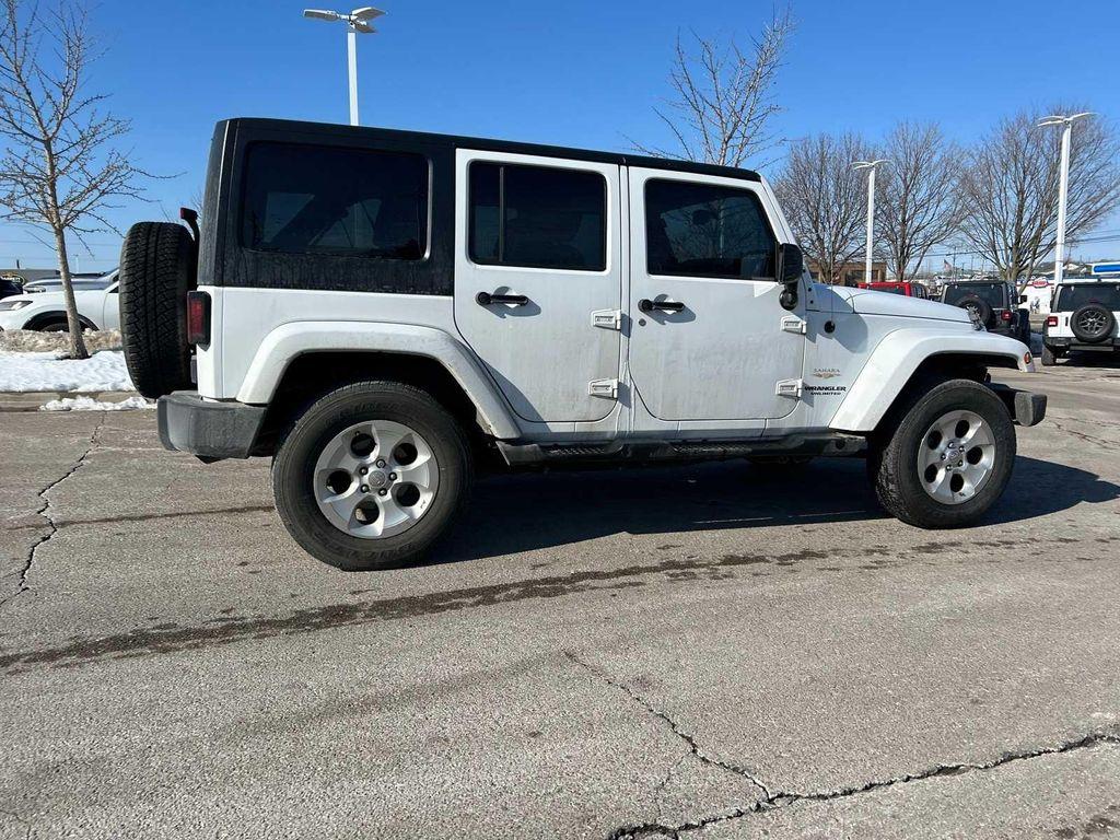 used 2014 Jeep Wrangler Unlimited car, priced at $16,999