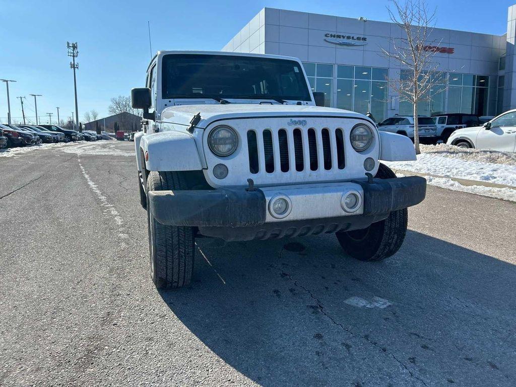 used 2014 Jeep Wrangler Unlimited car, priced at $16,999