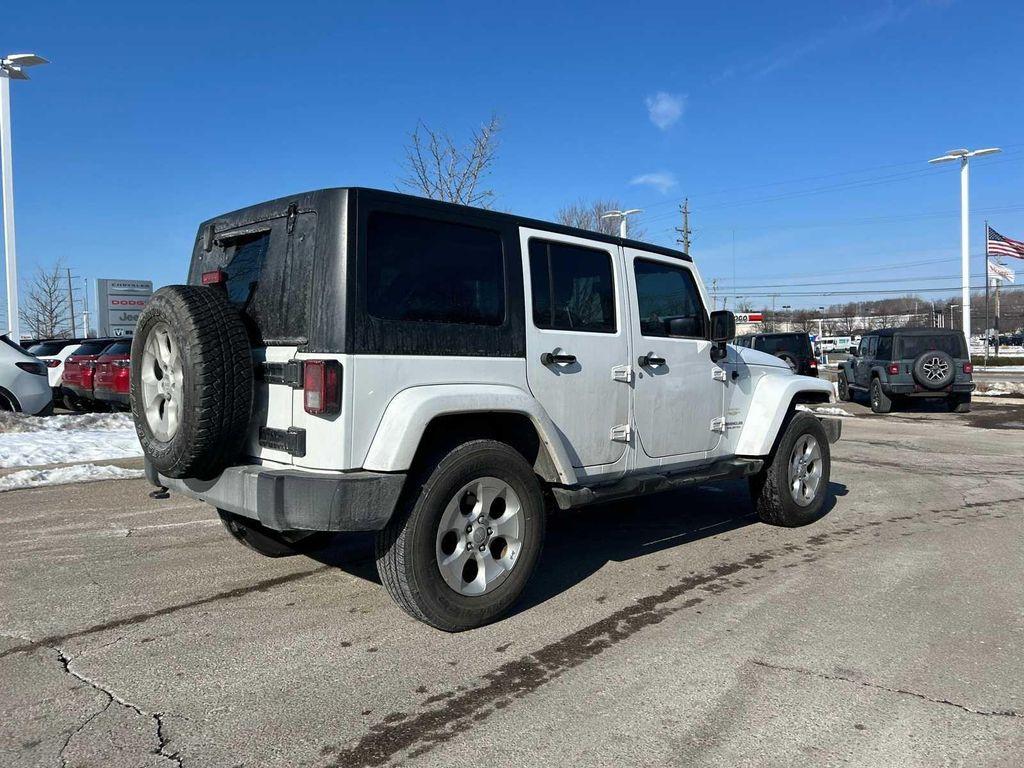 used 2014 Jeep Wrangler Unlimited car, priced at $16,999