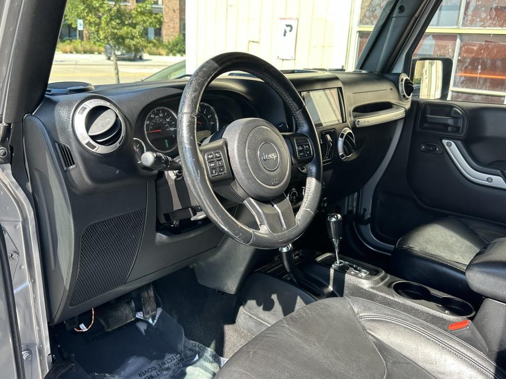 used 2015 Jeep Wrangler Unlimited car, priced at $13,900