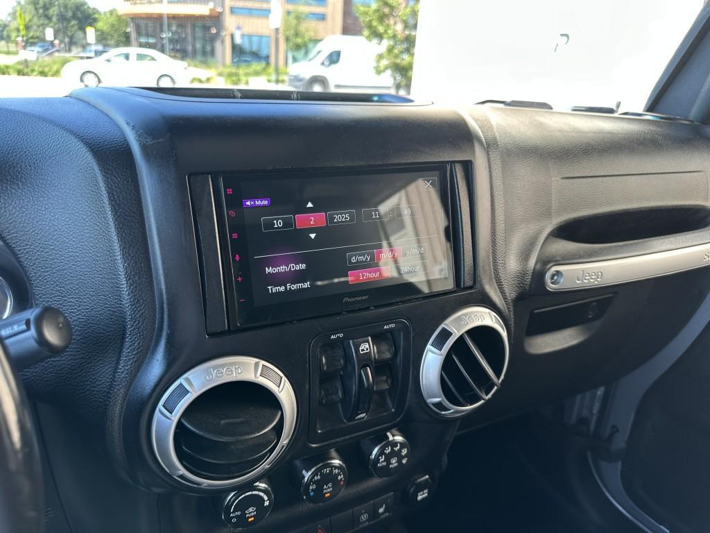 used 2015 Jeep Wrangler Unlimited car, priced at $13,900