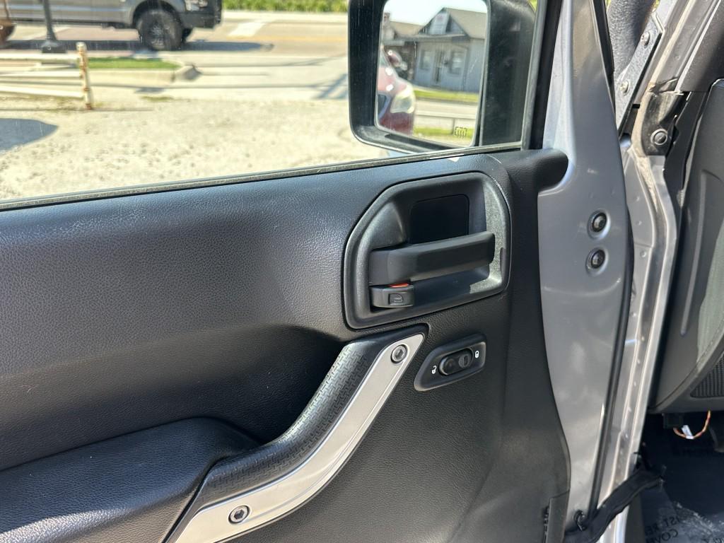 used 2015 Jeep Wrangler Unlimited car, priced at $13,900