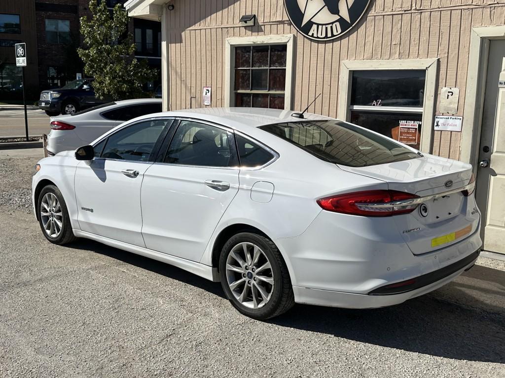 used 2017 Ford Fusion Hybrid car, priced at $5,900