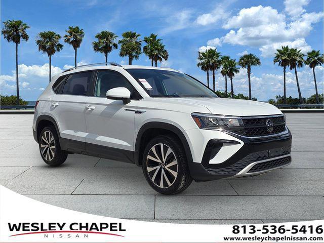 used 2024 Volkswagen Taos car, priced at $17,831