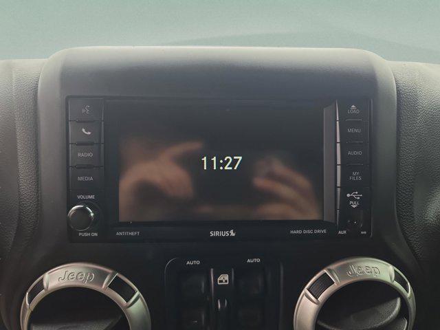 used 2017 Jeep Wrangler Unlimited car, priced at $19,973