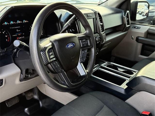 used 2018 Ford F-150 car, priced at $19,988