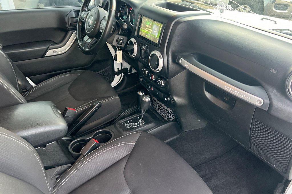 used 2014 Jeep Wrangler Unlimited car, priced at $17,998