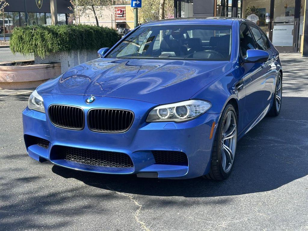 used 2013 BMW M5 car, priced at $57,900