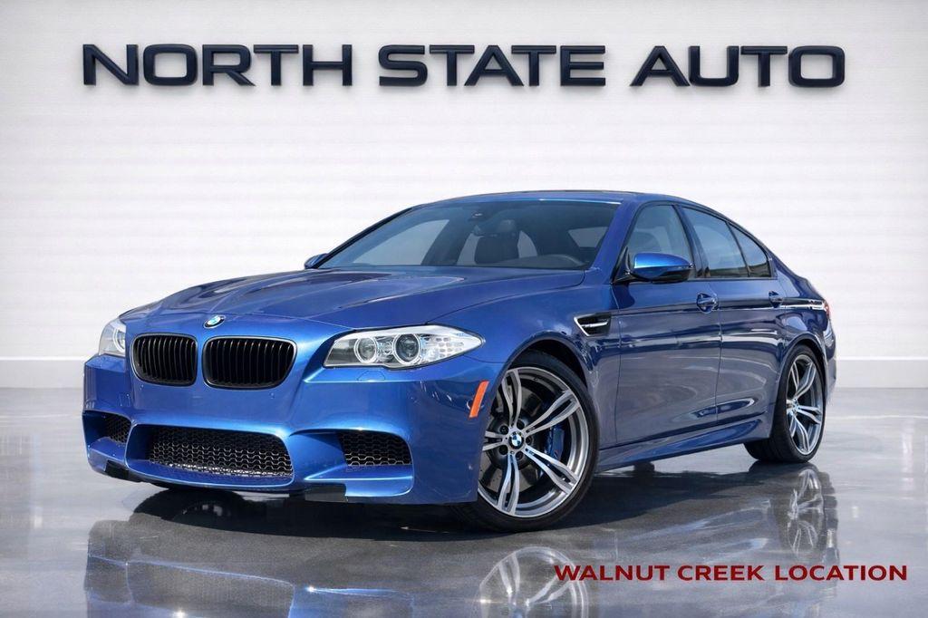 used 2013 BMW M5 car, priced at $57,900