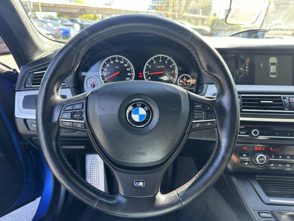 used 2013 BMW M5 car, priced at $57,900