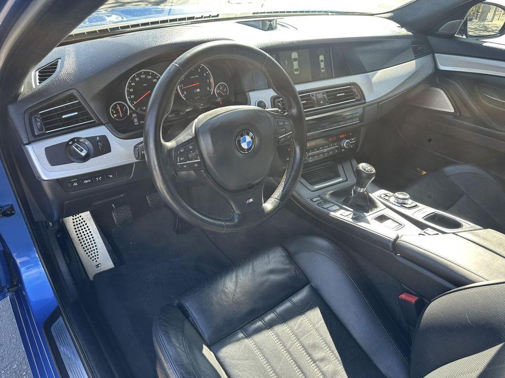 used 2013 BMW M5 car, priced at $57,900