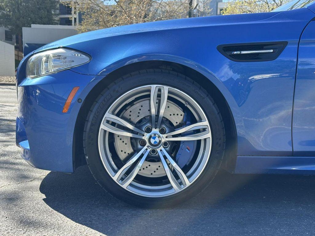 used 2013 BMW M5 car, priced at $57,900