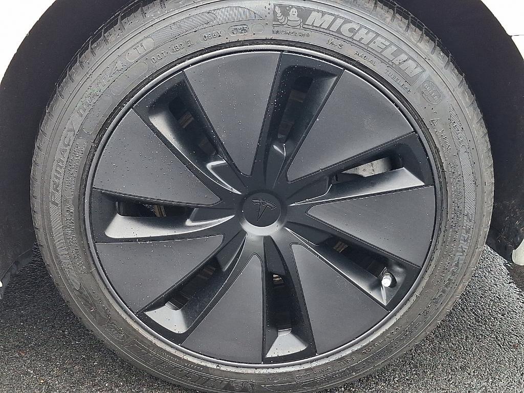 used 2025 Tesla Model 3 car, priced at $38,995