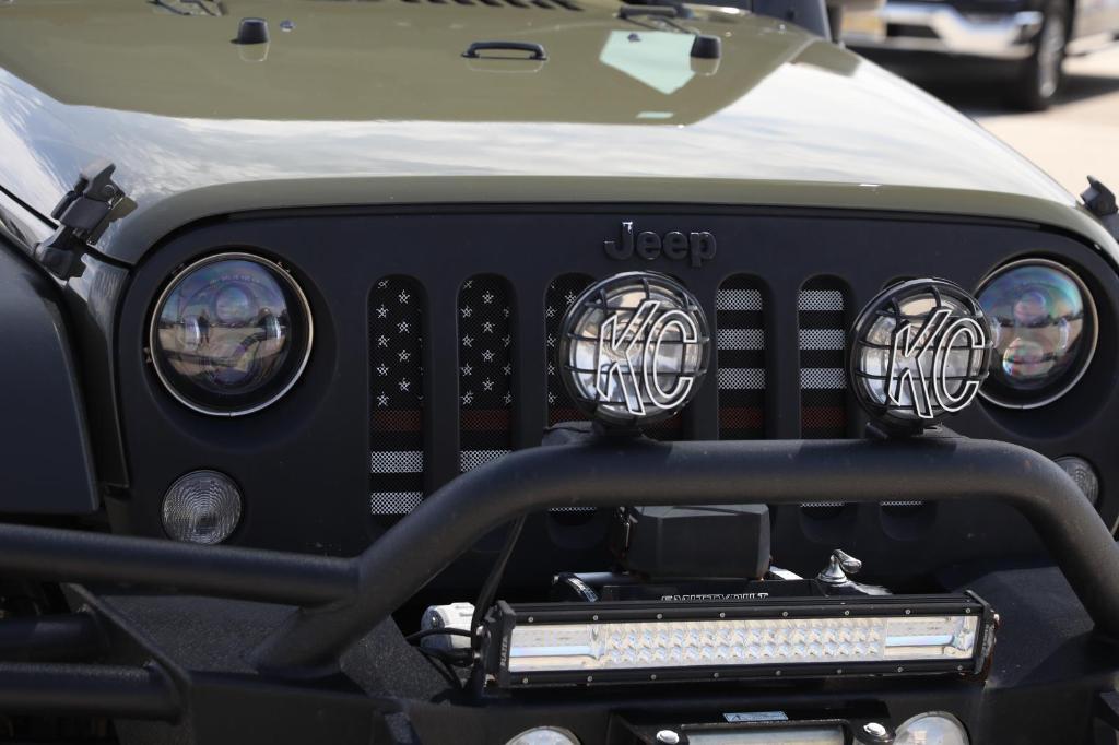 used 2015 Jeep Wrangler Unlimited car, priced at $13,498