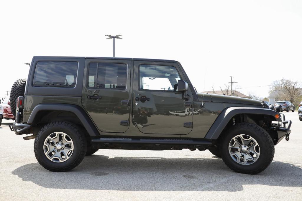 used 2015 Jeep Wrangler Unlimited car, priced at $13,498