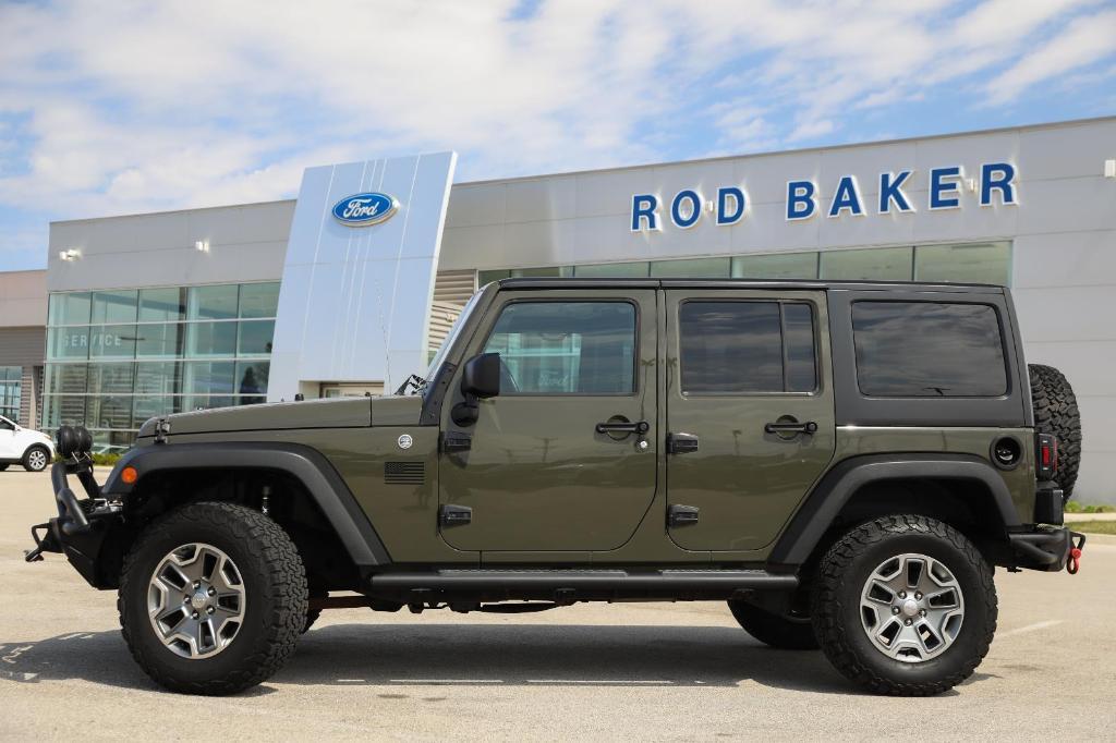 used 2015 Jeep Wrangler Unlimited car, priced at $13,498
