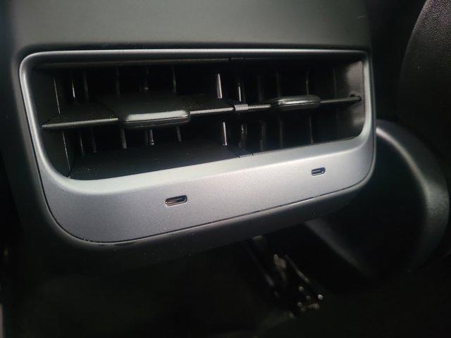 used 2025 Tesla Model Y car, priced at $38,599