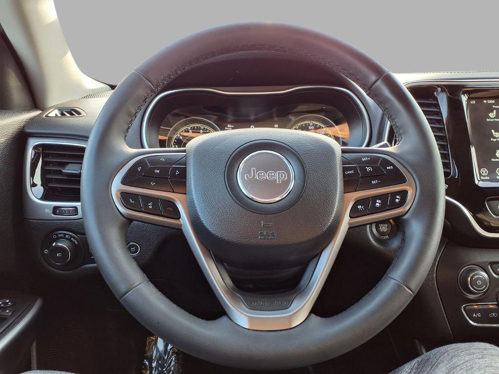 used 2021 Jeep Cherokee car, priced at $21,398